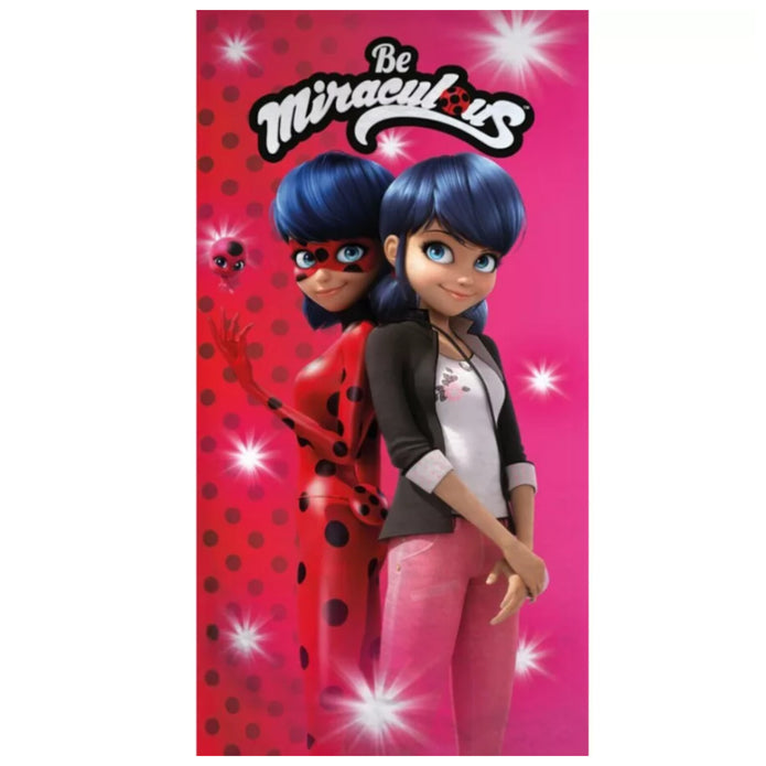 Παιδική πετσέτα θαλάσσης Quick Dry Miraculous Ladybug με την Marinette και την Ladybug σε ροζ φόντο  100% Microfiber