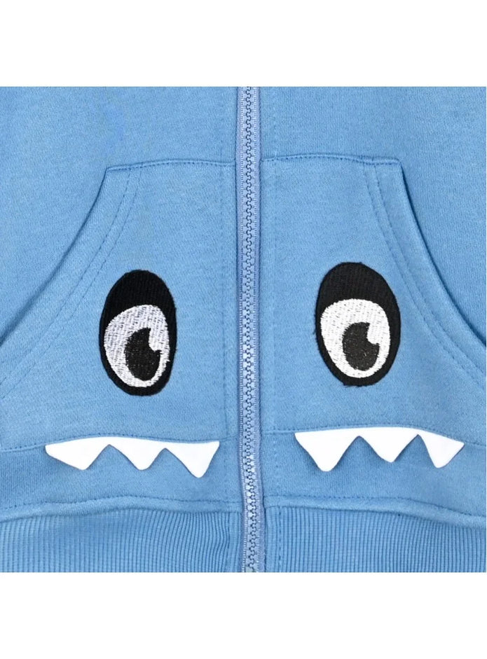 Παιδικό φούτερ με κουκούλα σε γαλάζιο χρώμα, διακοσμημένο με σχέδιο δεινοσαύρου, μάτια και δόντια στις τσέπες, ιδανικό για παιχνιδιάρικες και ζεστές εμφανίσεις για αγόρι 