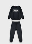 Παιδικό σετ φόρμας Energiers μαύρο με στάμπα “Understand” και παντελόνι με λάστιχο, 100% βαμβάκι.