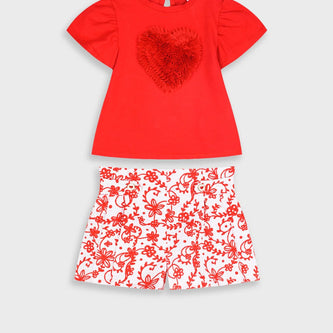 Βρεφικό σετ Energiers κόκκινη μπλούζα με τρισδιάστατη καρδιά και λευκό σορτσάκι με κόκκινο λουλουδάτο σχέδιο