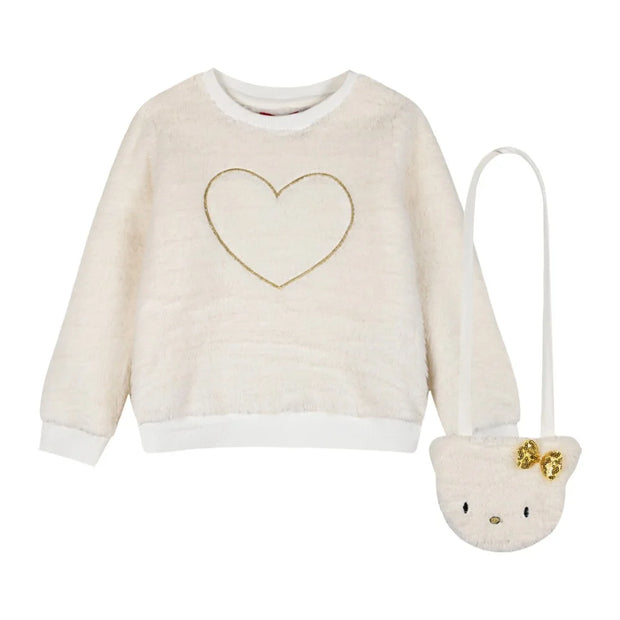 Παιδική λευκή φλις μπλούζα με χρυσή λεπτομέρεια σε σχήμα καρδιάς στο κέντρο και τσαντάκι σε σχήμα γατούλας με χρυσά διακοσμητικά. Ιδανική επιλογή για ζεστές και κομψές εμφανίσεις.