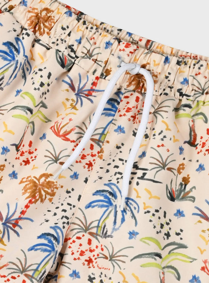 Παιδικό μαγιό σορτς Energiers για αγόρια με εμπριμέ τροπικό σχέδιο, φοίνικες και χρωματιστές λεπτομέρειες σε μπεζ φόντο.