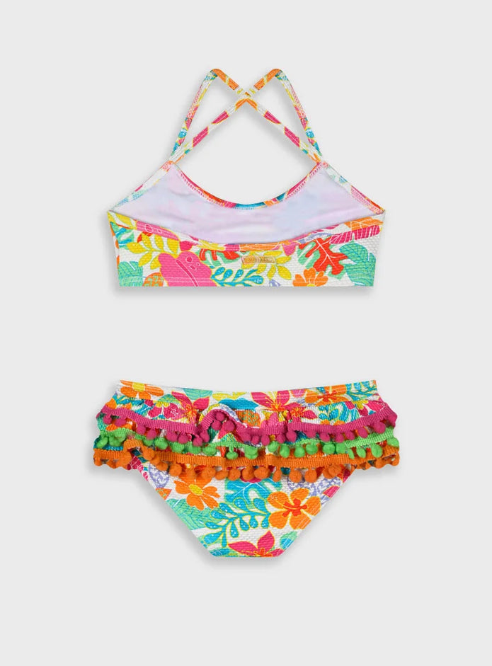 Crop top του παιδικού μαγιό μπικίνι Swimmy με πομ πομ και τροπικό μοτίβο

Πίσω όψη του σετ μαγιό μπικίνι Swimmy με χιαστί τιράντες και floral σλιπ

Παιδικό μαγιό μπικίνι Swimmy με πομ πομ και έντονα χρώματα

Κορίτσι φοράει το παιδικό μαγιό μπικίνι Swimmy στην παραλία
