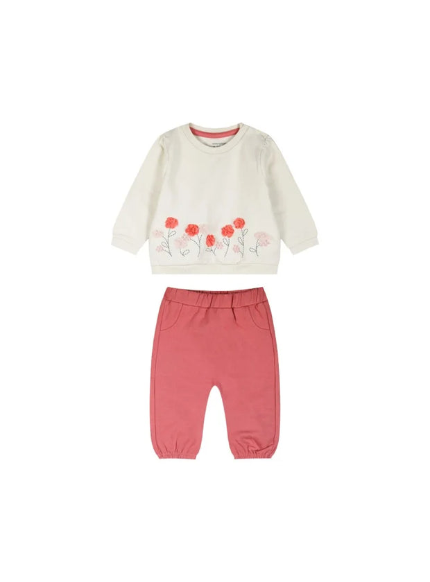 Σετ βρεφικών ρούχων για κορίτσι που περιλαμβάνει εκρού φούτερ με κεντημένα λουλούδια στο κάτω μέρος και ροζ παντελόνι με λάστιχο στη μέση και στους αστραγάλους. Ιδανικό για άνετες και κομψές εμφανίσεις